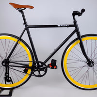 Yellow Rims and Black Frame on this Fixie Bike by Regal Bicycles Called the Hornet