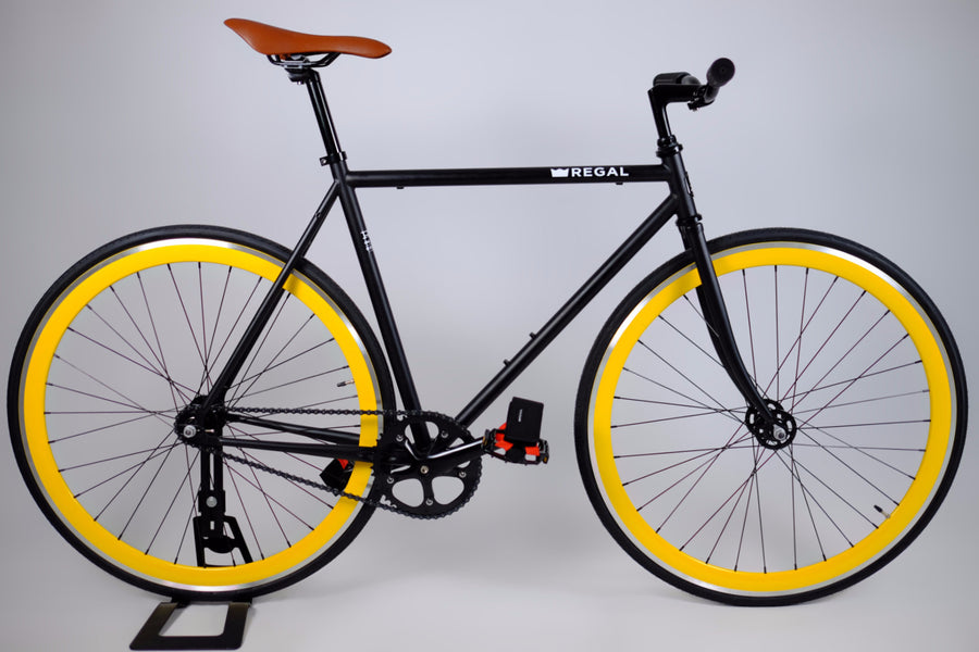 Yellow Rims and Black Frame on this Fixie Bike by Regal Bicycles Called the Hornet