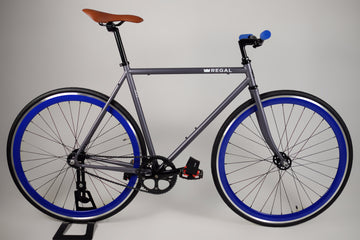 Matte Gray frame with Deep Blue Rims, the hubs are high flange flip flop for fixed gear and single speed riding.