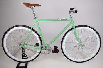 This Fixie Bike comes with a mint green frame and white rims, the flip flop hub allows for single speed riding or fixed gear riding